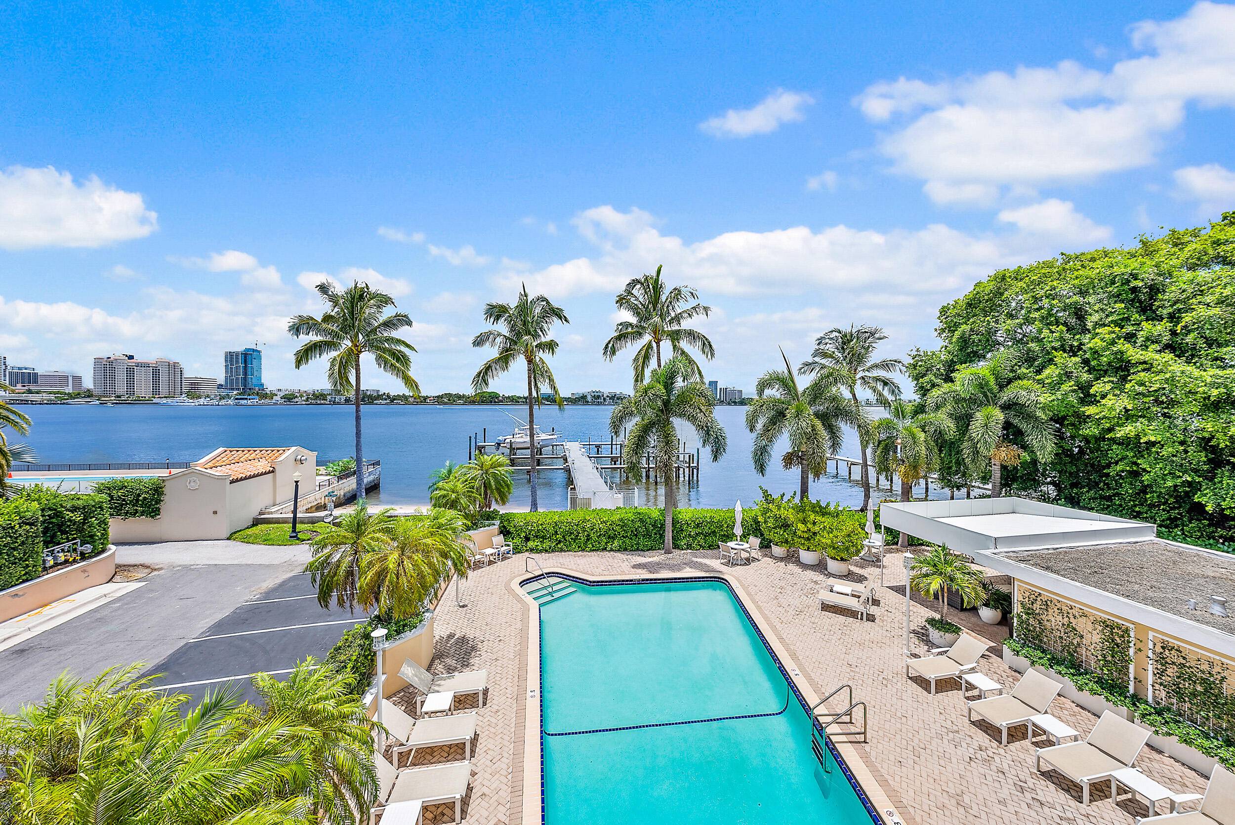 Enjoy unique panoramic intracoastal water views from the 60 ft balcony and nearly all rooms of this three bedroom, 2.
