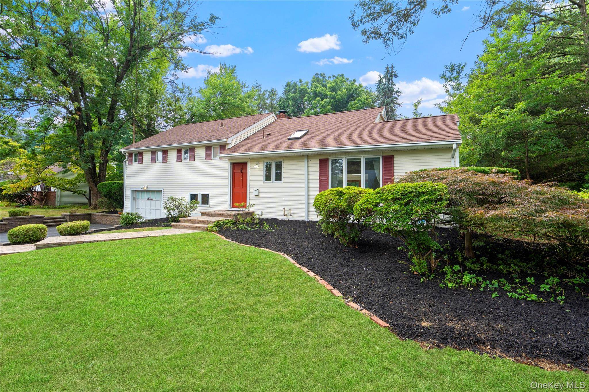 Welcome to this beautifully updated Split Level home in the desirable Rolling Woods neighborhood.