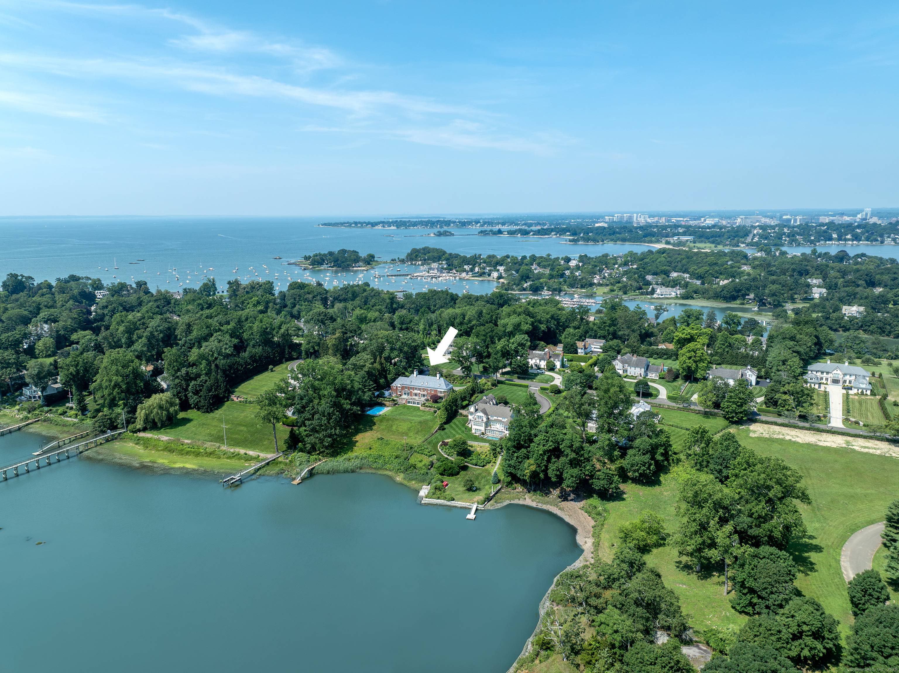Perched high on the bluff of Long Neck Point, this 6680sf custom built brick estate offers you unmatched privacy and panoramic water views, all in this captivating natural environment where ...