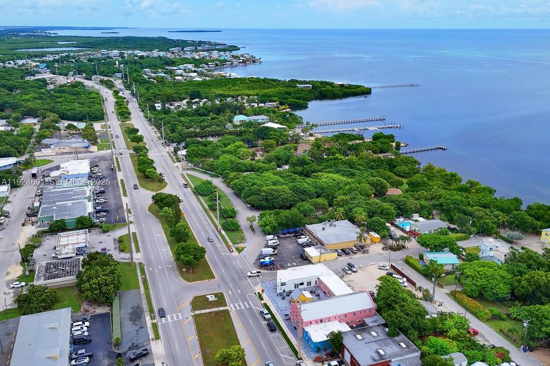 Presenting an unparalleled new investment opportunity on the Overseas Highway at Mile Marker 98 in Tavernier FL Keys, featuring 143 feet of direct frontage and offering a truly turn key ...