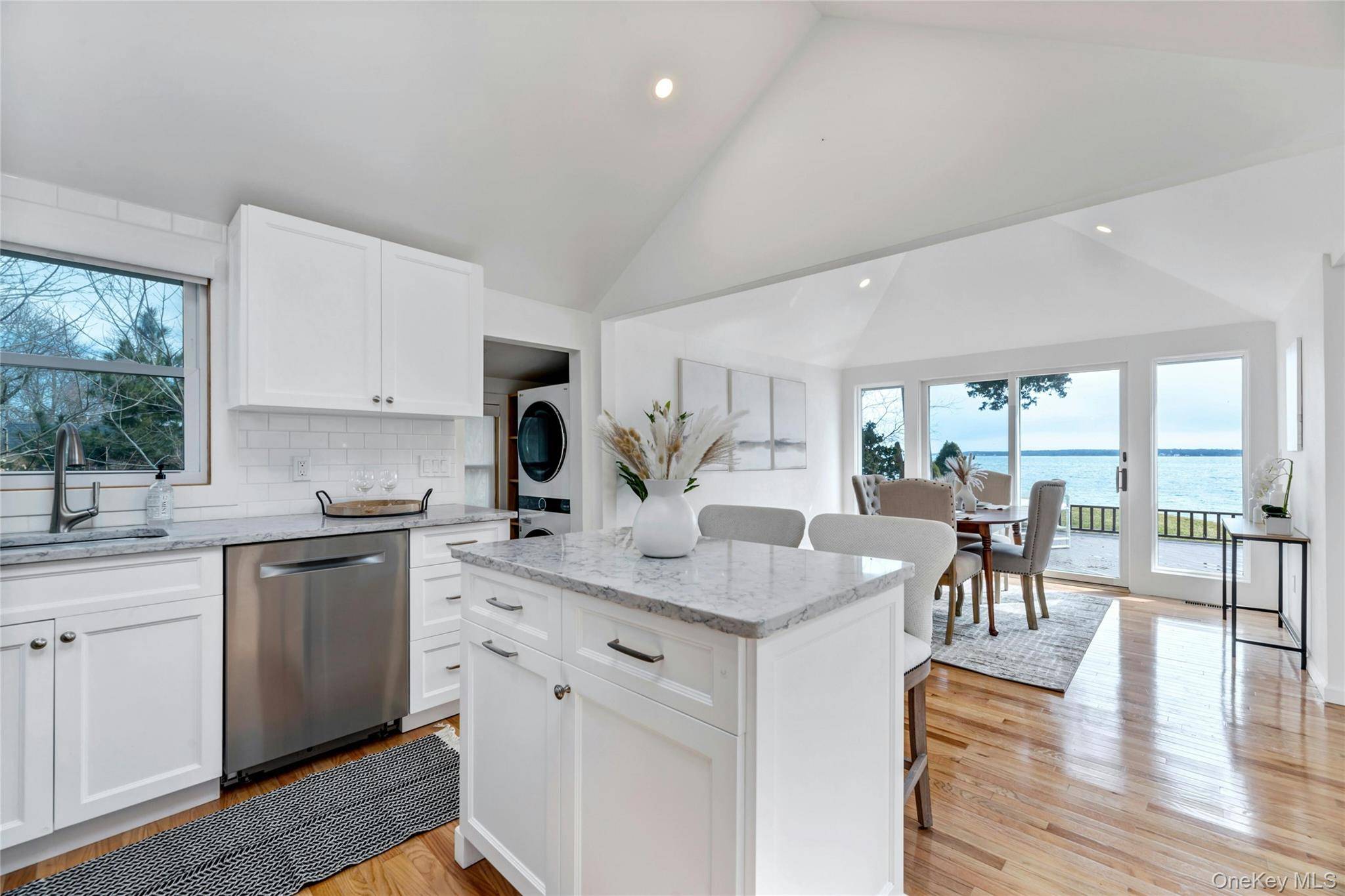 NORTH FORK DIRECT BAY FRONT GEM ON QUIET STREET WITH HIGH ELEVATION AND 115' FRONTAGE Introducing a captivating waterfront property on the Peconic Bay in Jamesport boasting a large lot ...