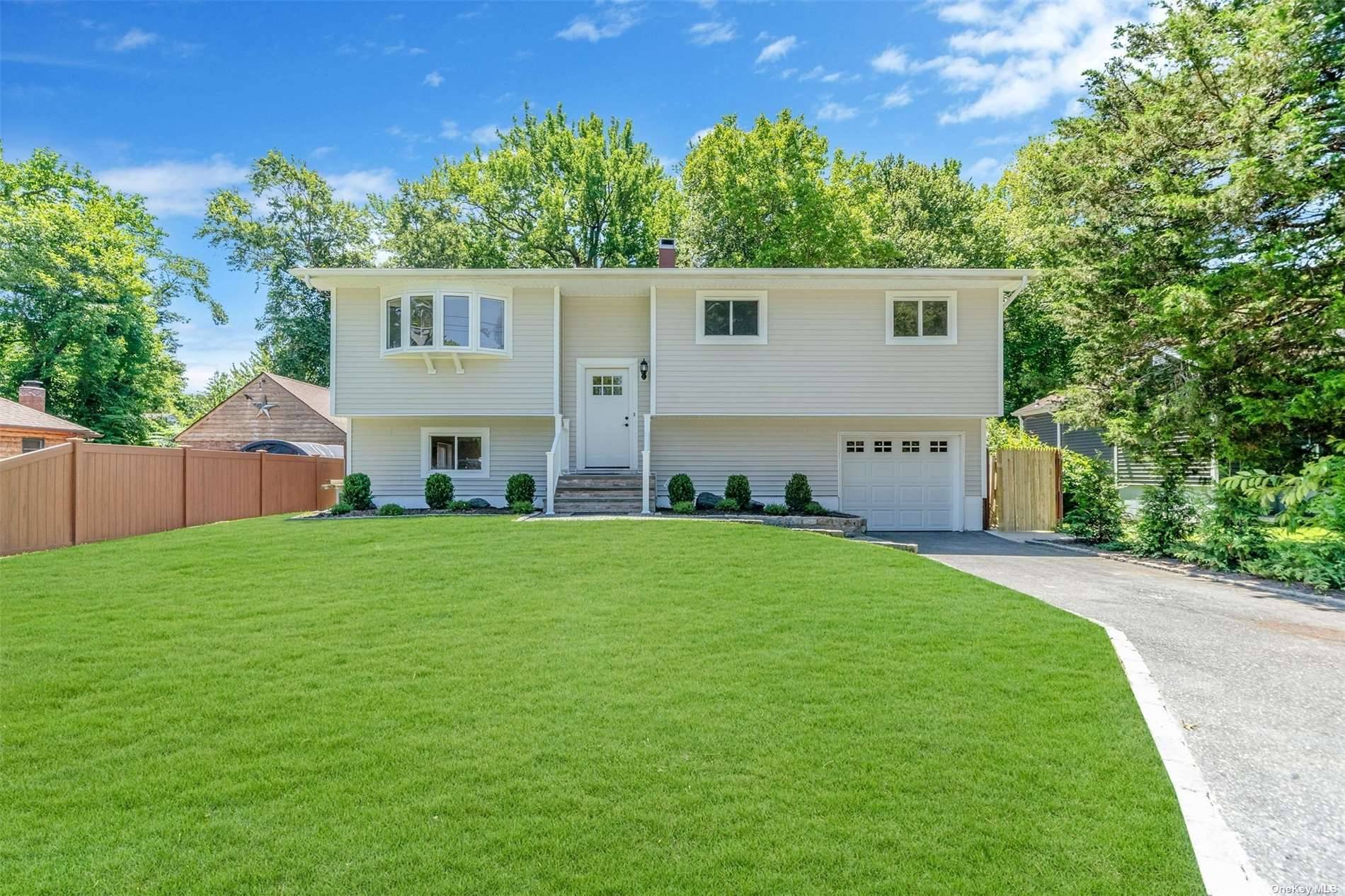 Welcome to your fully renovated 4 bedroom Hi Ranch style home.