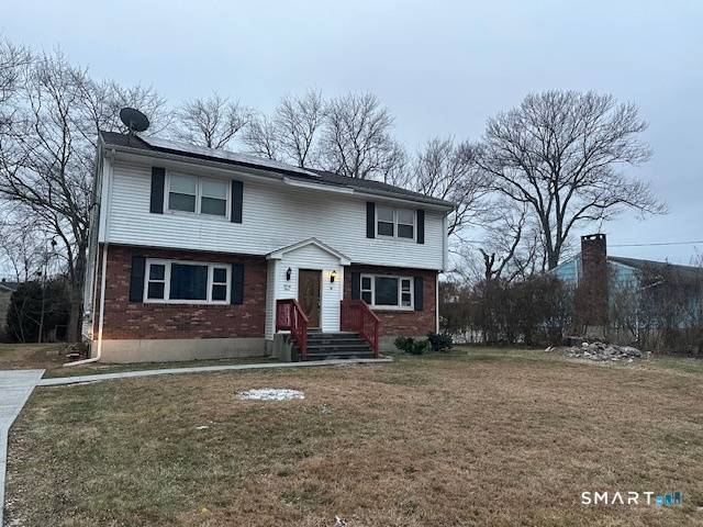 A spacious two family townhouse is for sale, offering excellent living space and investment potential.