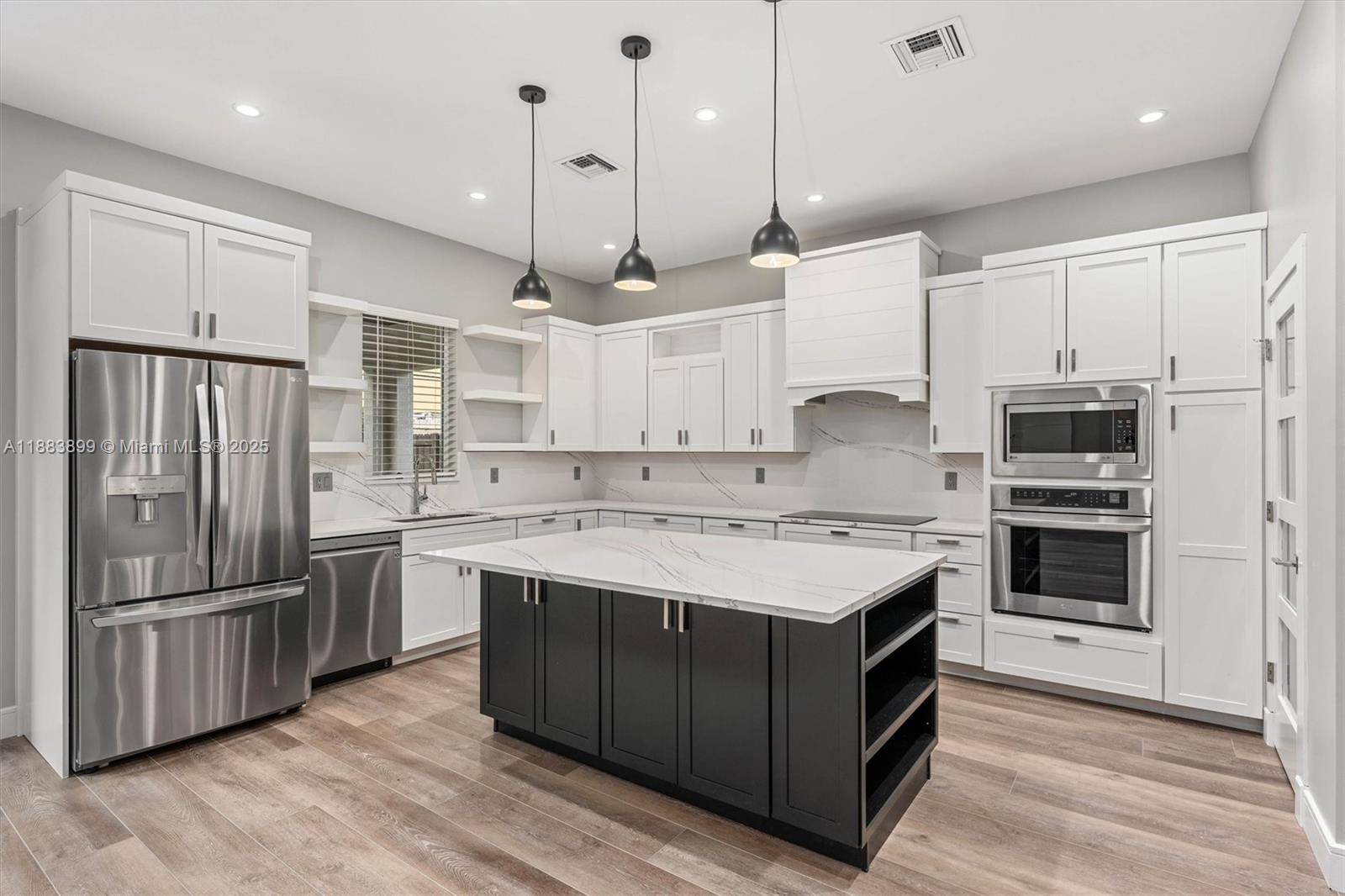 Discover refined elegance in this spacious duplex, offering two identical 3 bedroom, 3 bath residences.