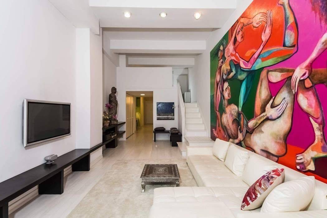 Stunning, modern with clean lines, this magnificently renovated multi level unit has 12.