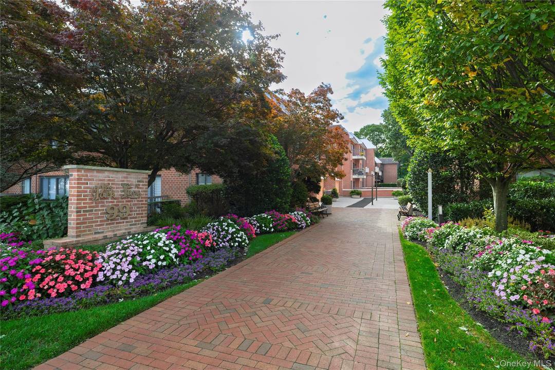 Enjoy luxury living in this massive 1779 sq ft corner unit in the heart of the Village of Rockville Centre.