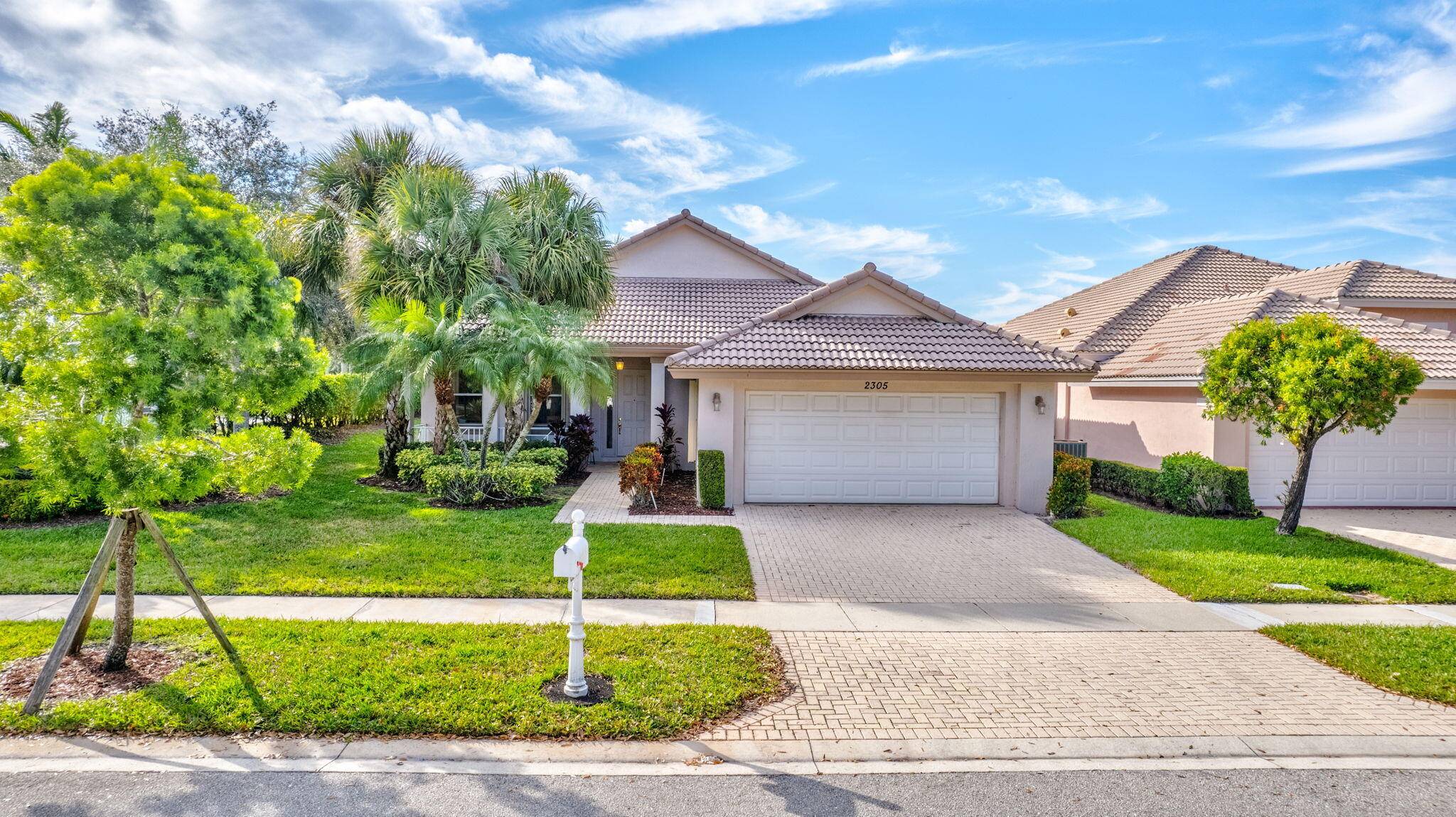Immaculately maintained, this great room style floor plan features a large front covered patio and expanded back covered paver patio to relax and enjoy your morning coffee or afternoon wine.