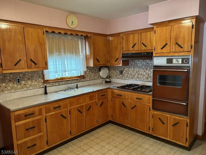 Opportunity knocks. Large legal two family home with three bedrooms in each unit.