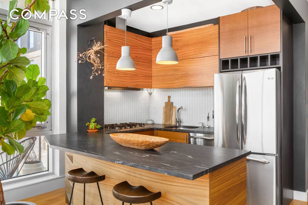 This striking Astoria 2 bedroom apartment with a large balcony has been reimagined by an incredible interior designer.