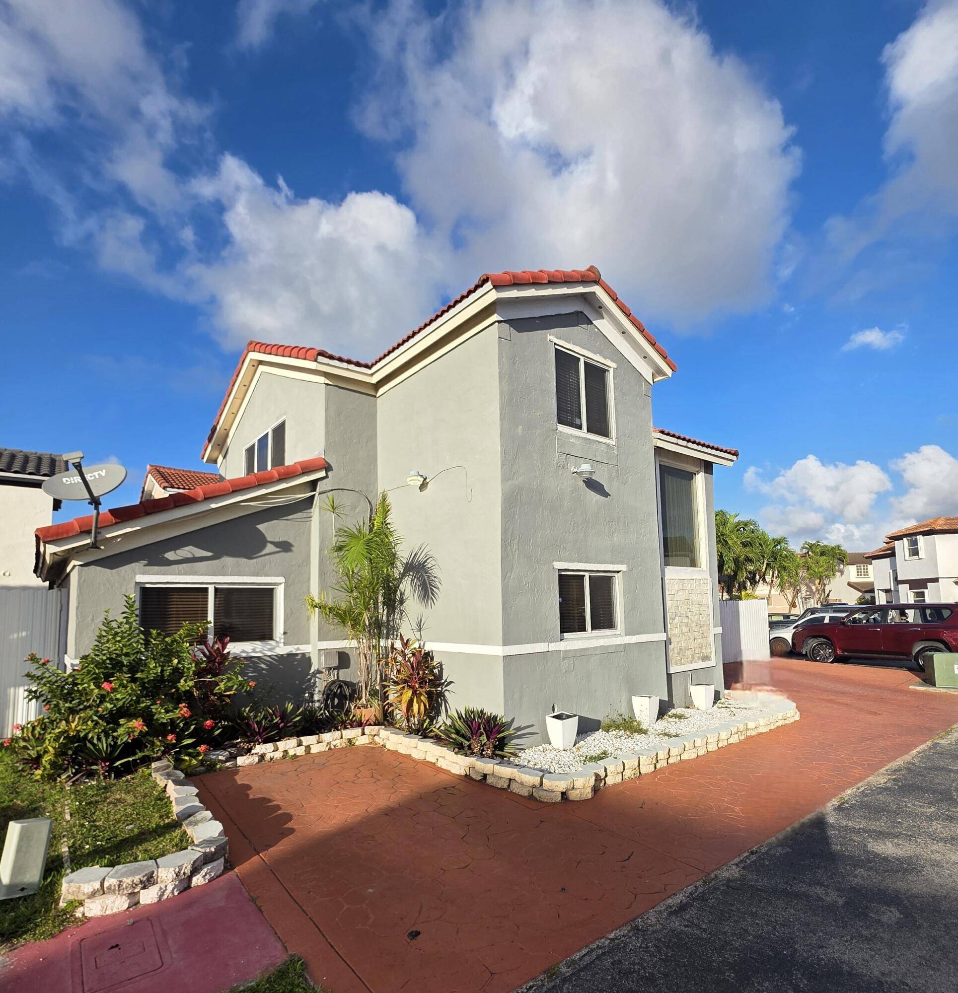 his charming two story corner lot home features 4 spacious bedrooms and 3 full bathrooms, offering a perfect blend of comfort and style.