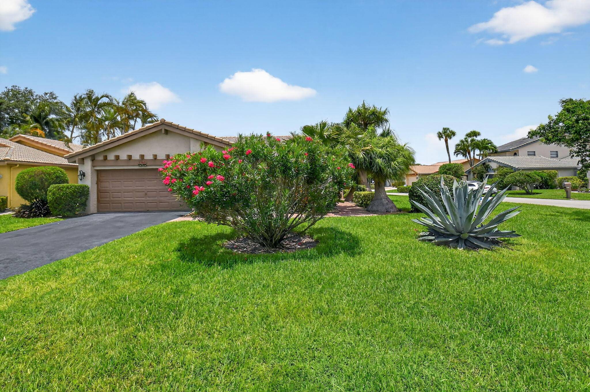 Welcome to this hidden gem located in the highly desirable Villas of Green Glen within the 55 prestigious Indian Spring Country Club with no mandatory membership.