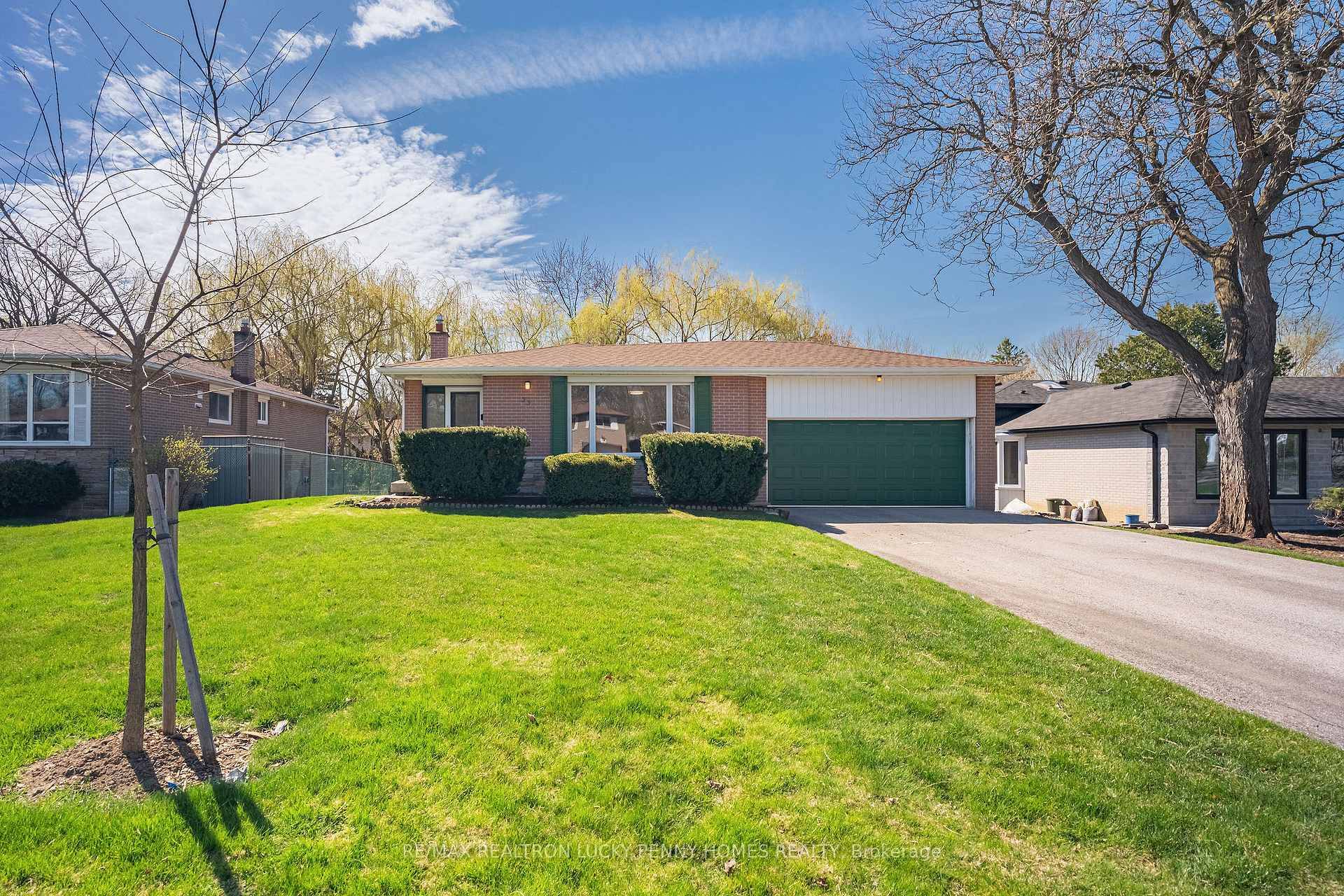 Tucked away on a quiet, tree lined street in the highly sought after Bullock neighbourhood, this rarely offered 2 car garage bungalow is a true hidden gem.