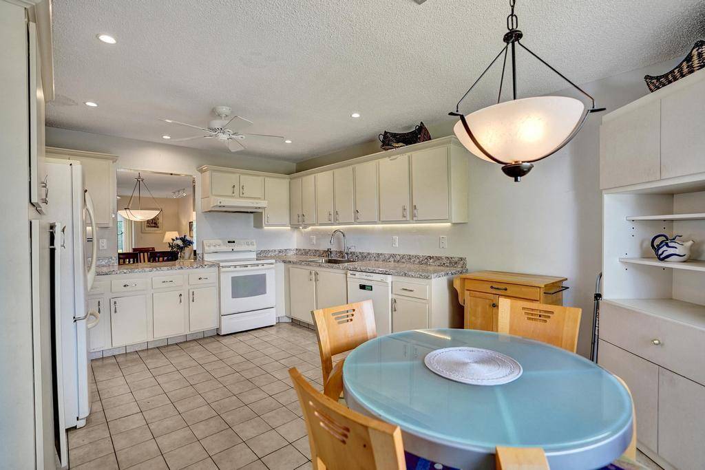 SPACIOUS 2 2 w bonus room off the master bedroom that can be used as a study or exercise room.