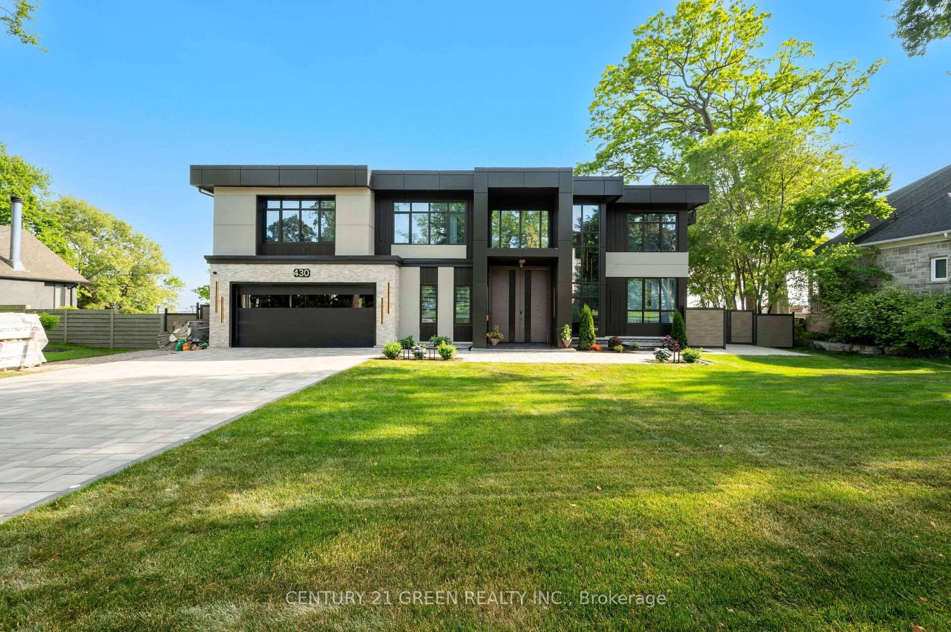 Lakefront newly custom built home feels like a retreat, completed in November 2024, offering over 6, 350 sq ft of total living space across three levels with gorgeous panoramic water ...