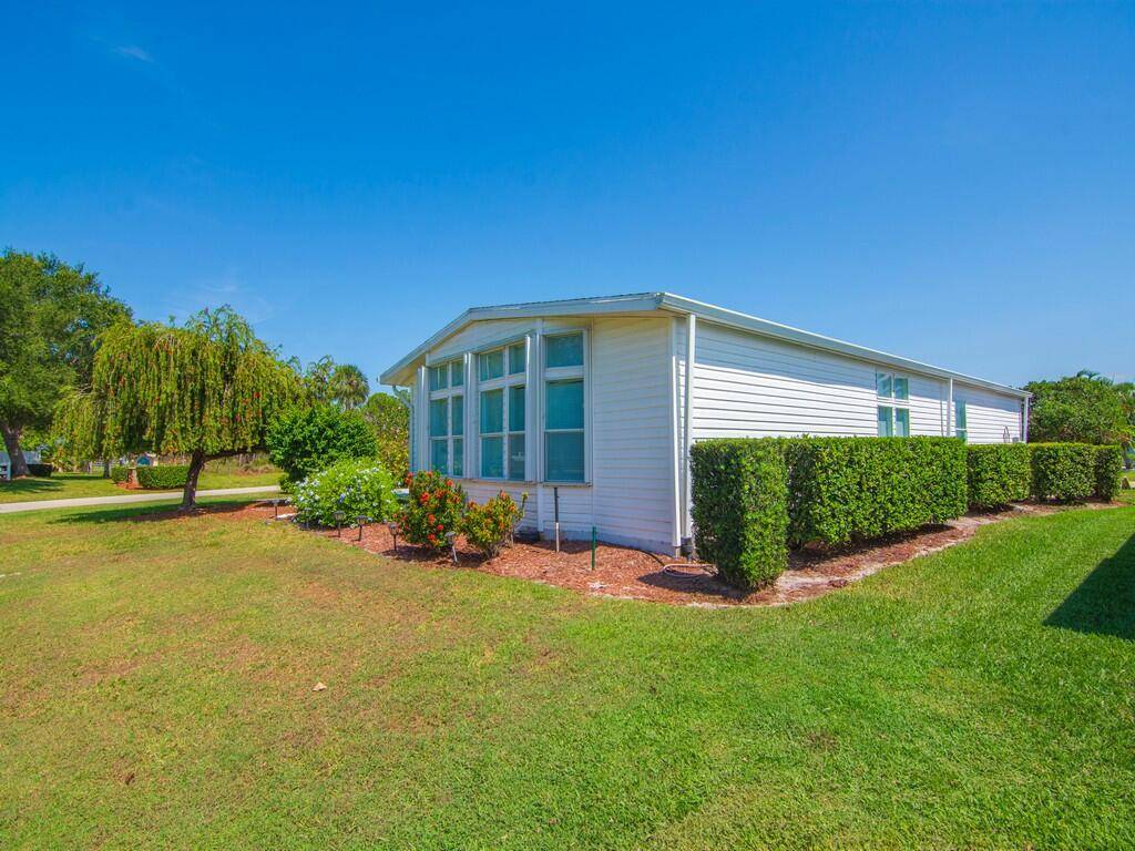 Welcome to this stunning 2 bedroom, 2 bath home nestled on a prime corner lot in the highly sought after 55 Savanna Club community.