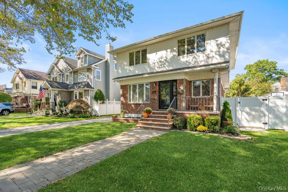 A rare blend of modern design and timeless charm in the heart of North New Hyde Park.