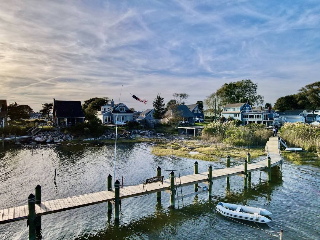 Hard to find, waterfront property with a new 50 ft dock in desirable Lord's Point community !