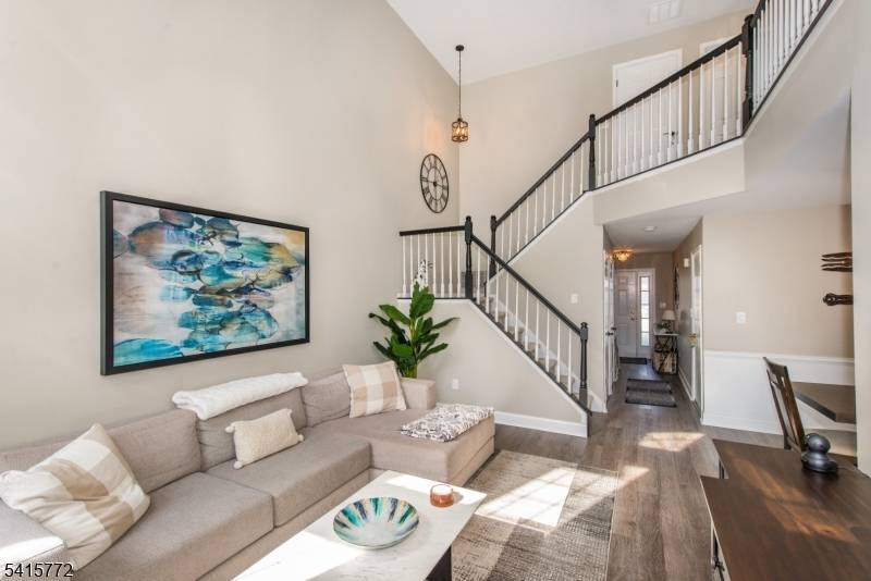 Welcome to this beautifully updated townhouse in the sought after Glen Brooke community, offering sophisticated design, impressive architectural details, and thoughtfully updated living spaces throughout.