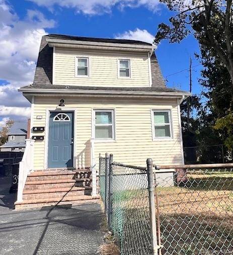 Welcome to your ideal investment opportunity on a serene dead end street.