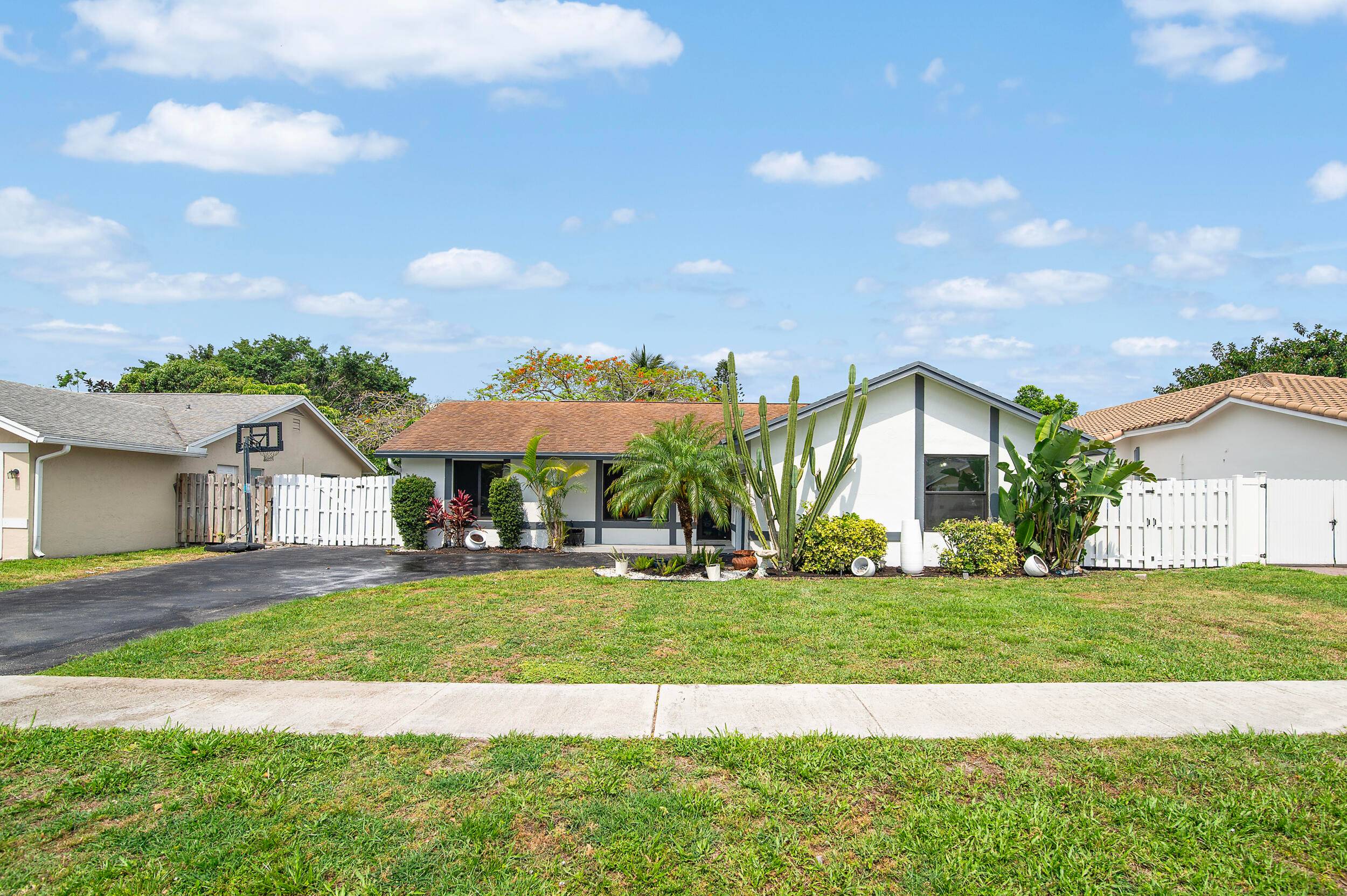 Stunning lakefront home with minimal HOA fees awaits !