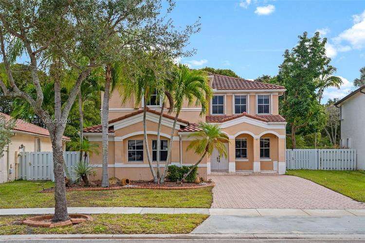 Welcome to this spacious 4 bedroom, 3 bathroom pool home located in the desirable Nautica Isles community of Miramar.