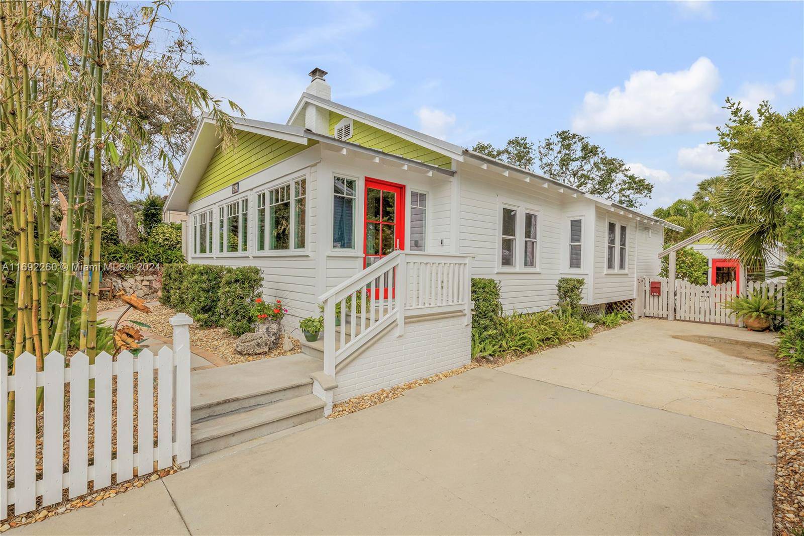 Beach home with adjacent buildable seperate lot.