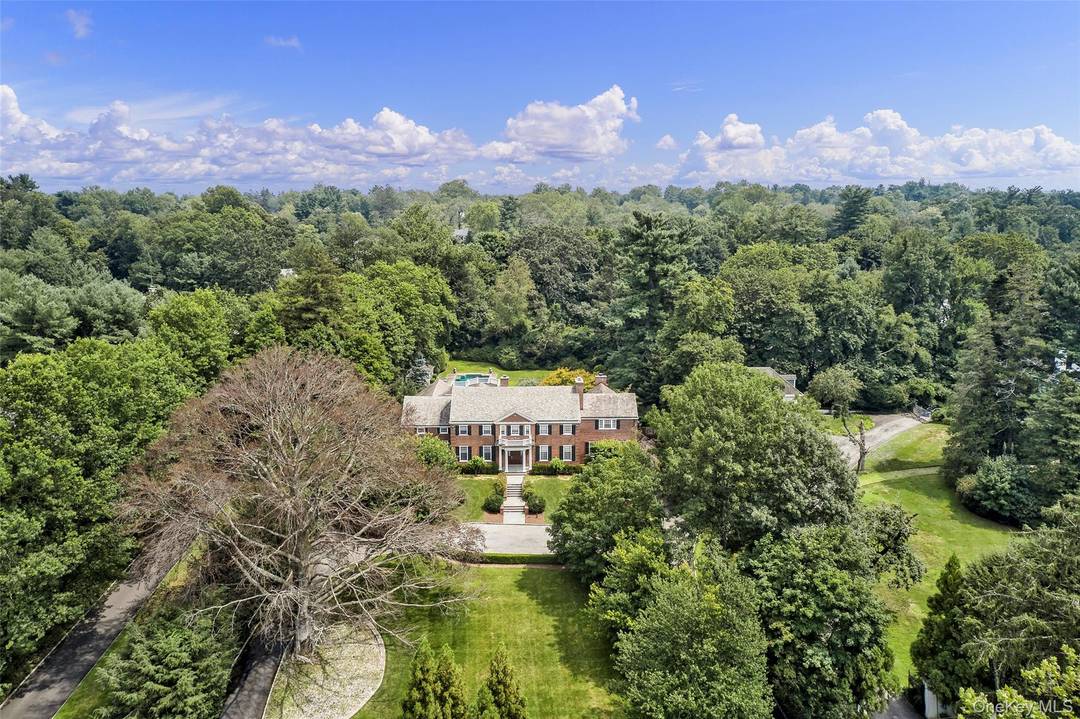 Extraordinary legacy property on one of the most coveted streets in Scarsdale.