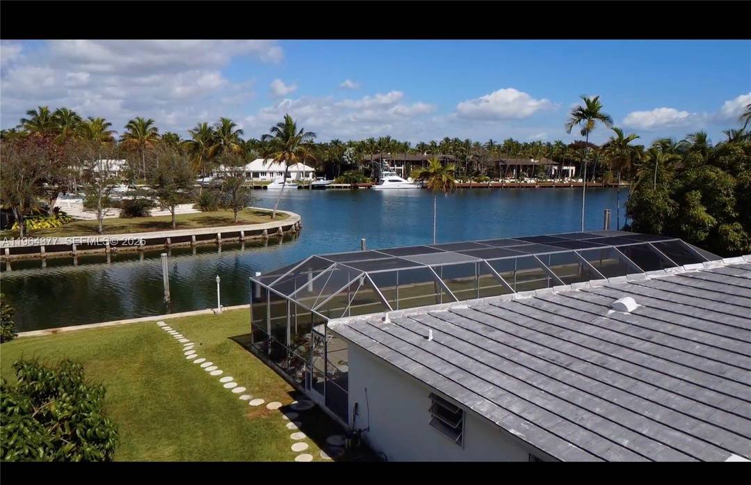 180 feet on the water with wide water views of the Gables Estates Old Cutler Bay lagoon.