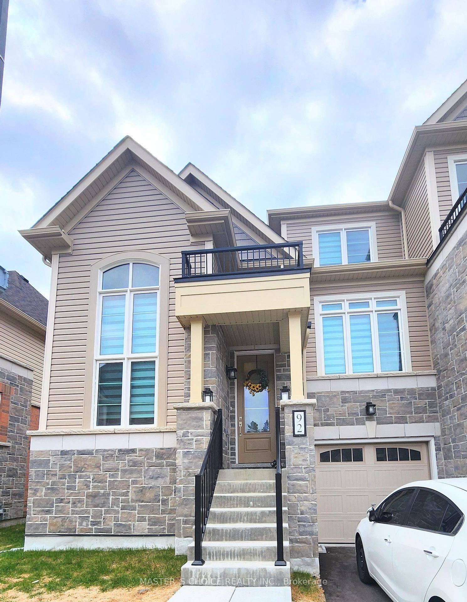 Less than 2yrs old End Unit Townhome back on Ravine feels like a Semi.