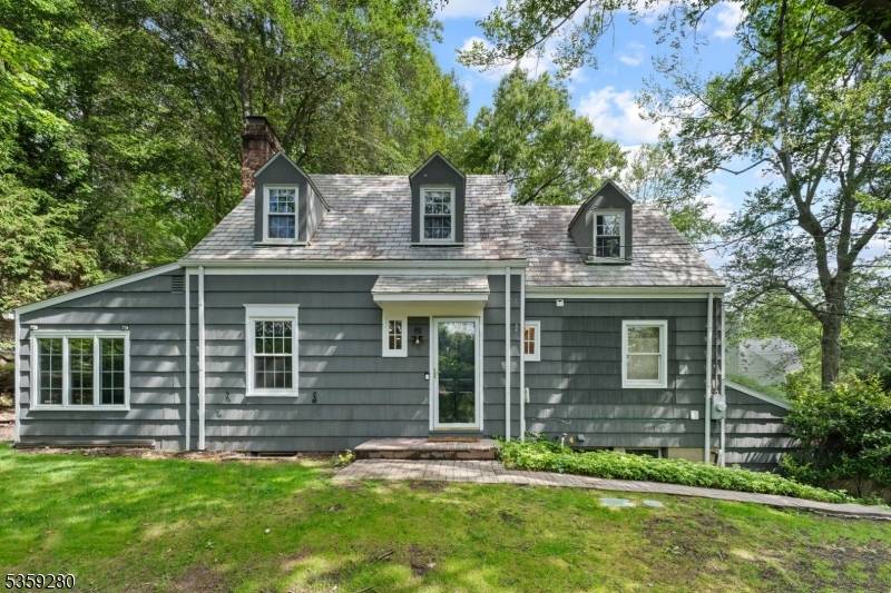 Located on one of MOUNTAINSIDE'S most desirable cul de sacs, this stunning custom Colonial Home spans three levels of beautifully finished living space.