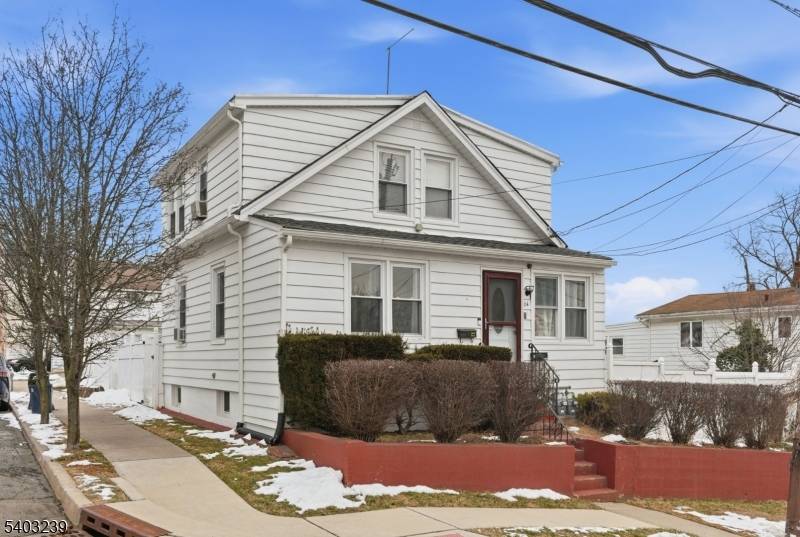 The first unit offers two bedrooms, a living room, eat in kitchen, and a full bathroom.