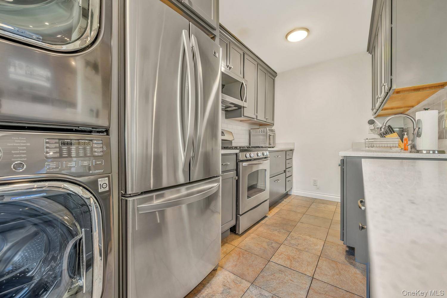 Top Floor 2 Bedroom Co op with Attic Deluxe 2 bedroom co op featuring efficiency kitchen, dining area, separate living room, and renovated bathroom.
