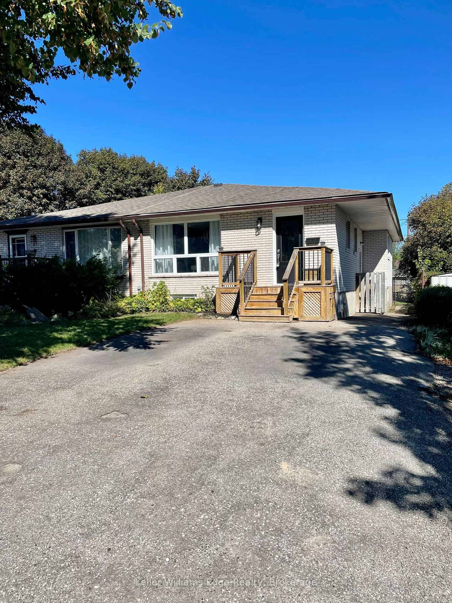 Clean and affordable semi detached property with separate entrance to lower level.