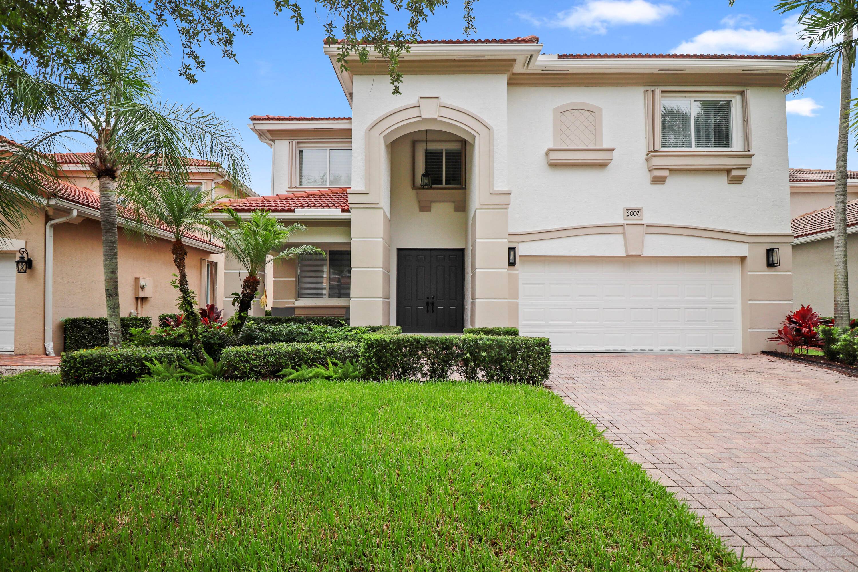 Elegant 4BR 2. 5BA plus Den, pool home in prestigious gated Highlands Reserve.