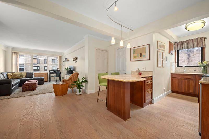 A MUST SEE ! Large fully renovated 1 bedroom apartment on a tranquil, tree lined street !