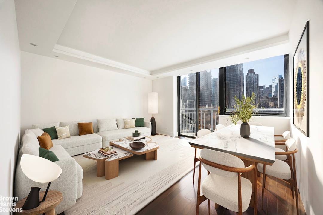 A Midtown East Gem Residence 25 is a sun drenched, top floor two bedroom home offering open, city views and a south facing balcony approximately 49 sqft.
