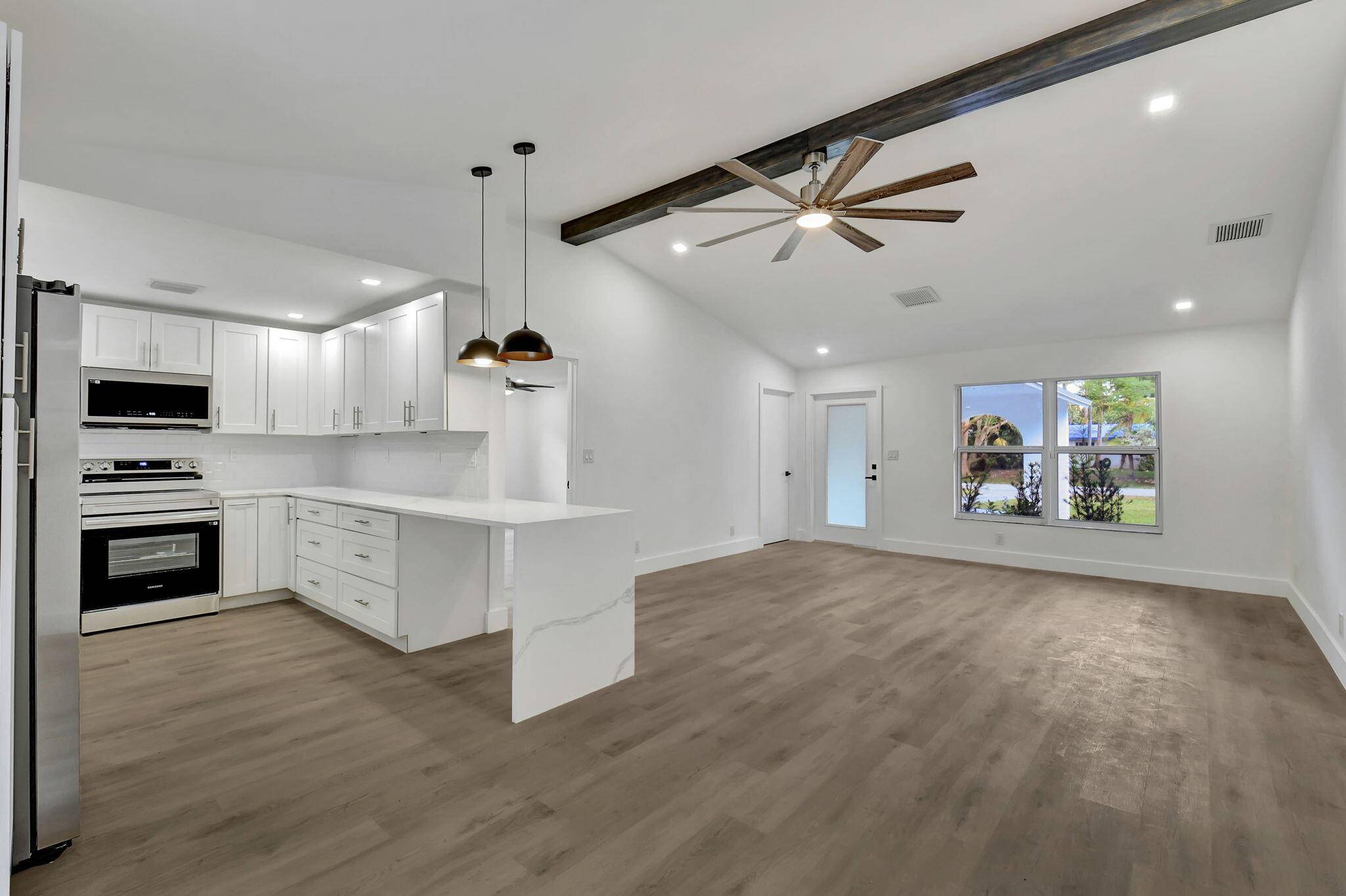 Welcome to this fully renovated gem in the heart of Delray Beach !
