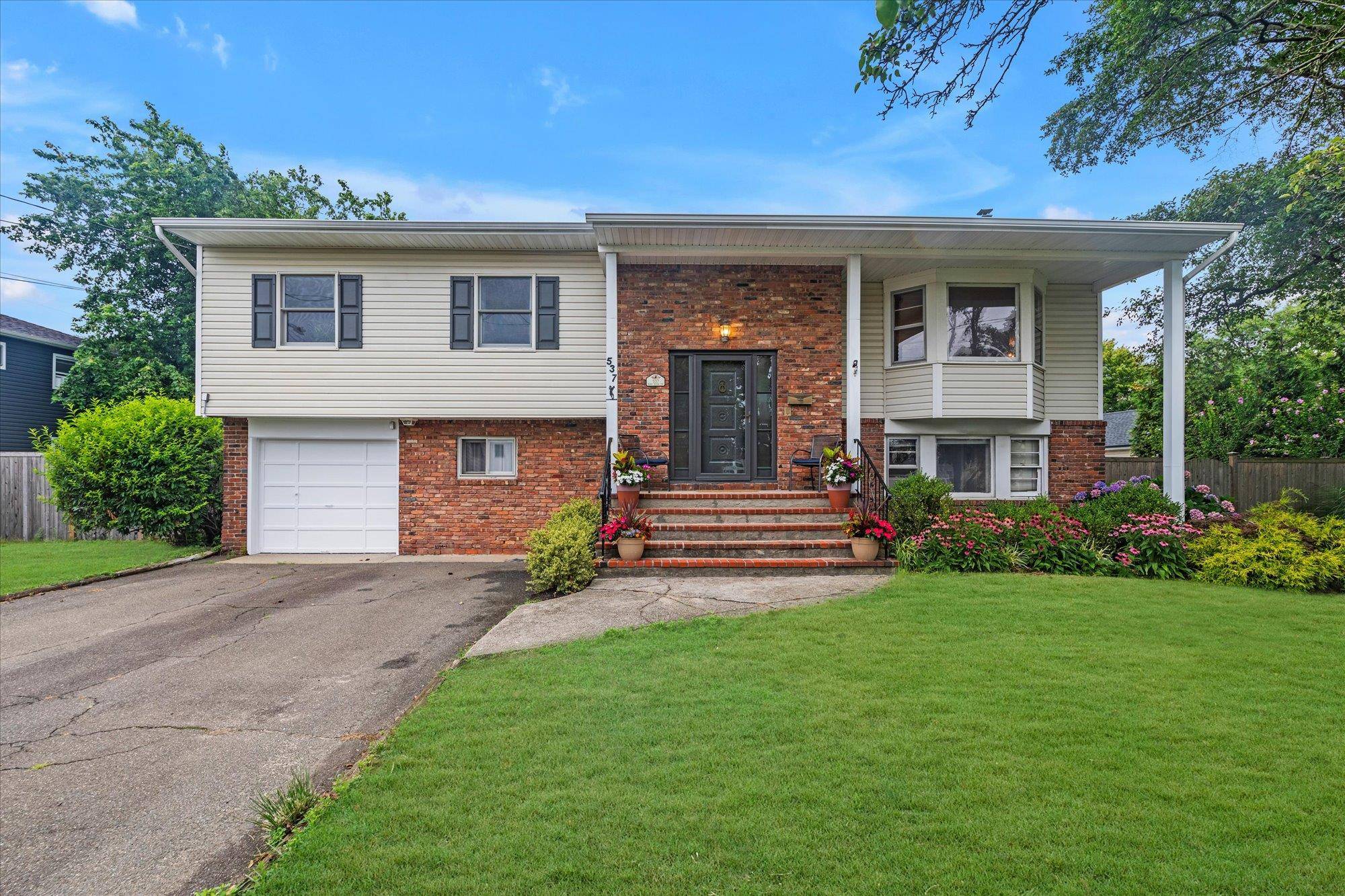 This Custom Built, Wide Line Hi Ranch is located in one of West Islip s most desirable beach and boating communities.