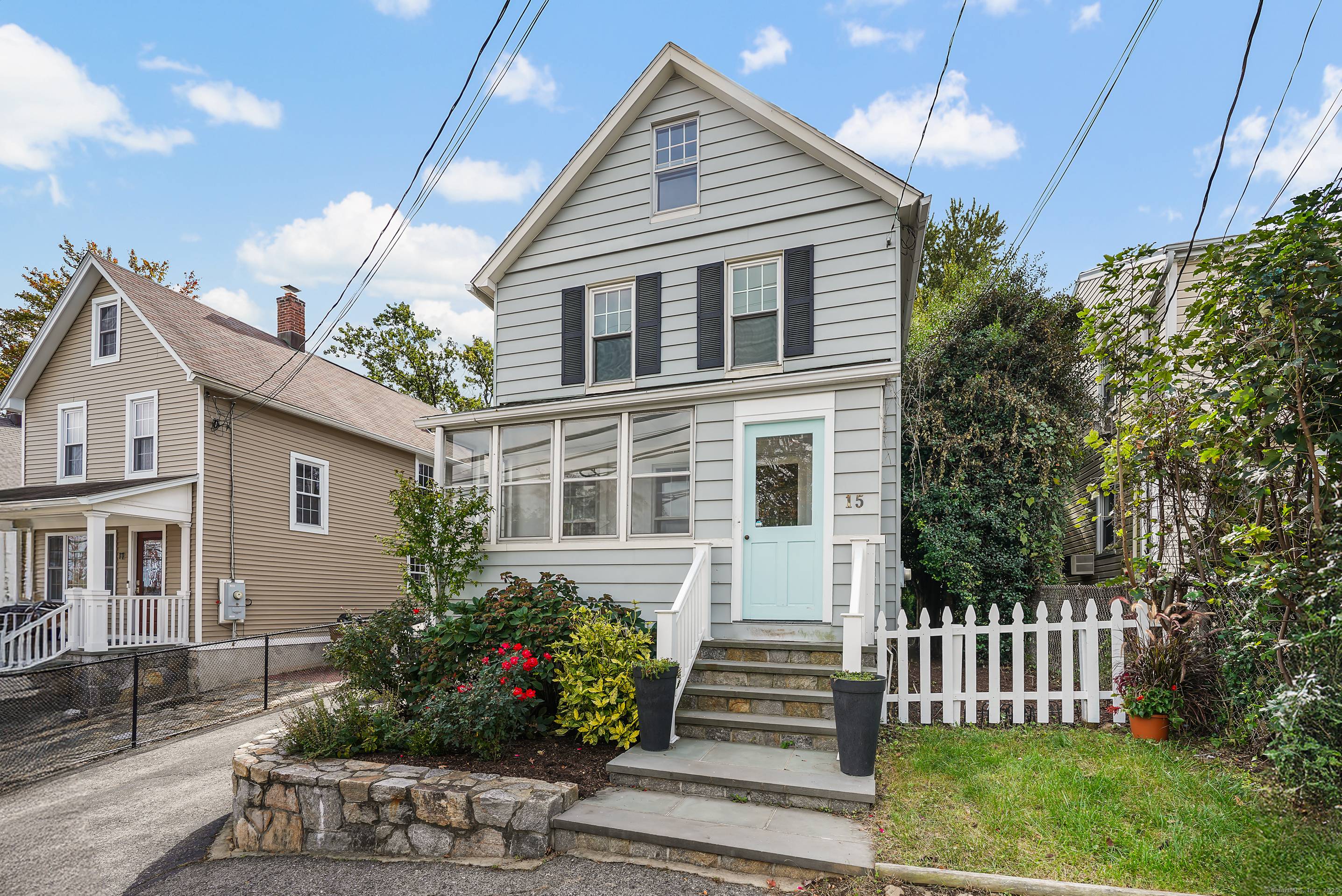 Welcome to coastal living at its finest in this charming 1910 Colonial, just a short walk from Cove Island Park and beach.