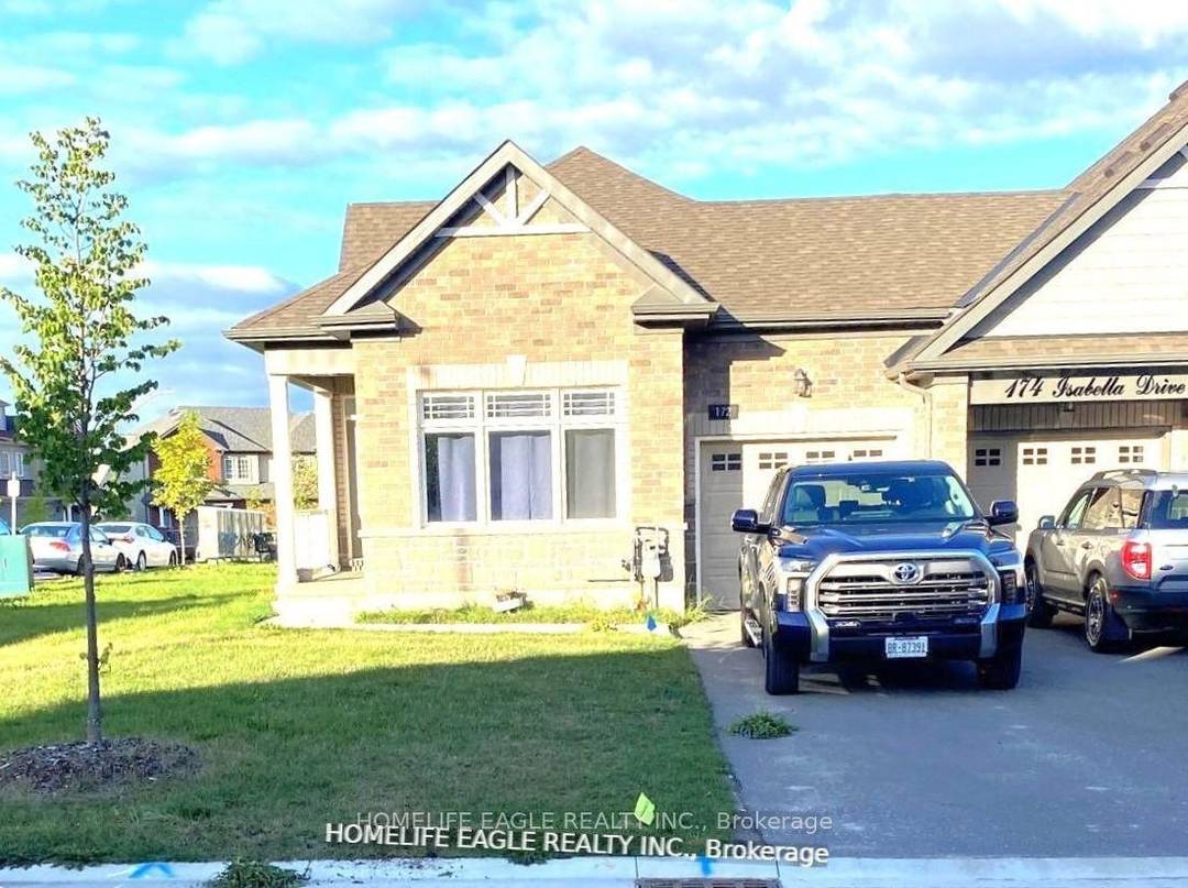 Lives like a detached home, this 5 year old corner bungalow townhouse is attached only by the garage.