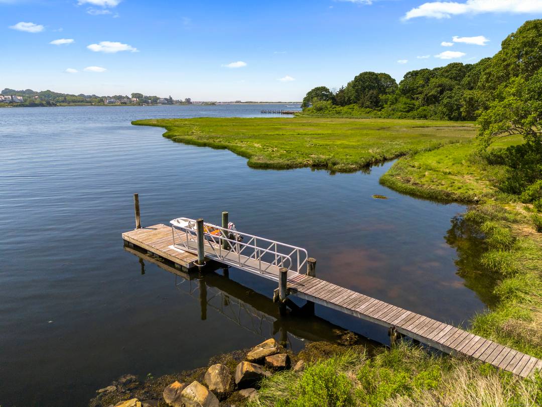 Located on highly desirable Osbrook Point in Stonington, CT this 3 waterfront property with a dock offers incredible privacy with panoramic views out toward Watch Hill, RI of the Pawcatuck ...
