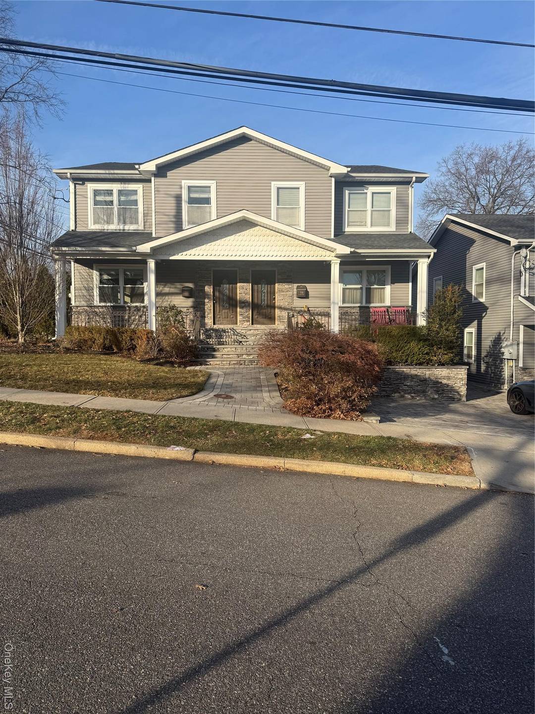 A beautifully updated Duplex including a finished basement, laundry hookup, open floor plan and a private fenced yard.