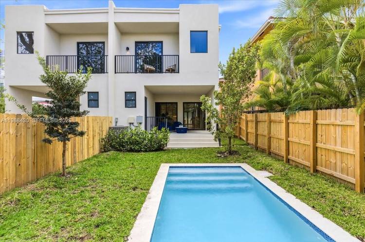 Rare new construction townhome with private plunge pool and European finishes.