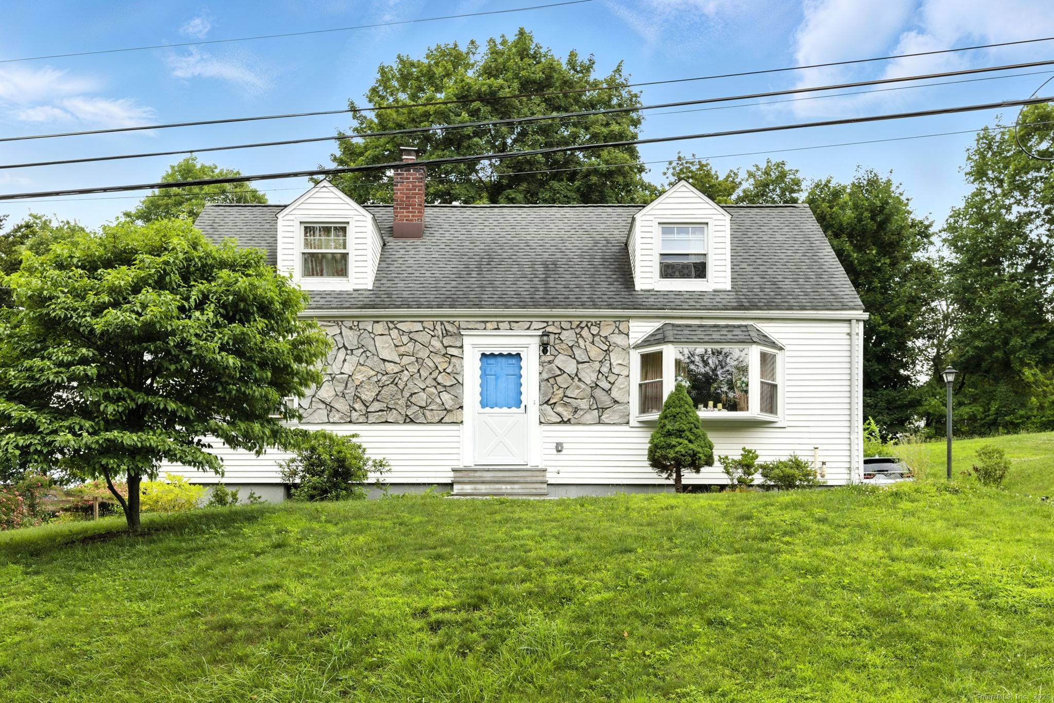 Welcome to this charming 4 bedroom, 2 bath Cape Cod style home that blends classic character with modern comfort.