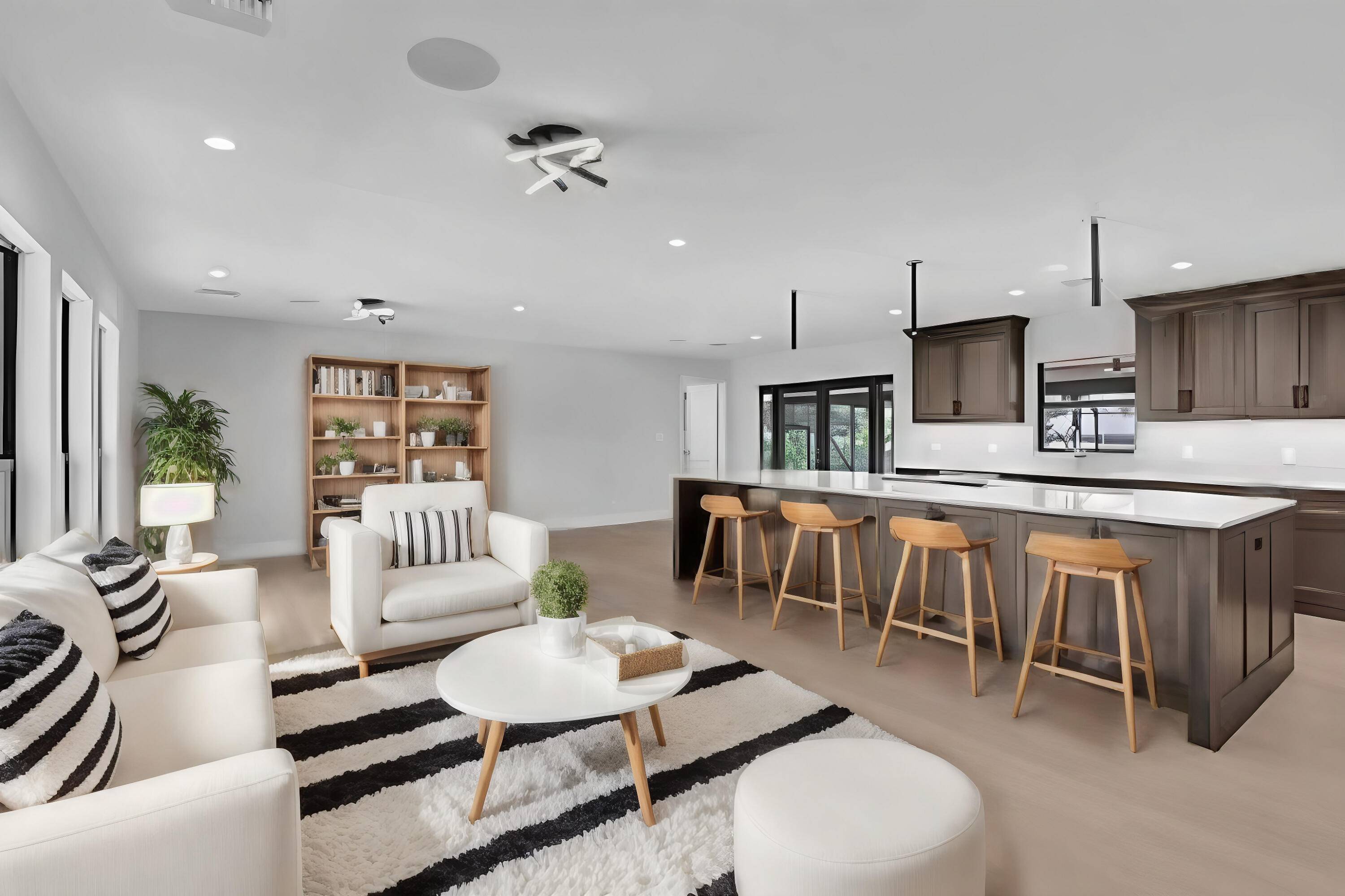 Experience luxury living in this stunning, newly renovated one story home, set on a sprawling lot in East Boca Raton.