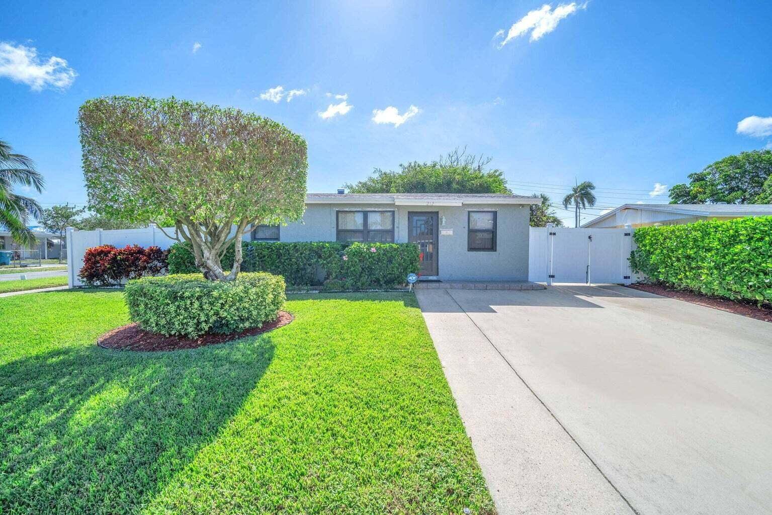 Just 2 miles from the intracoastal, this 3 bedroom, 1 bath gem sits on a beautifully manicured corner lot with lush landscaping and white vinyl privacy fencing.