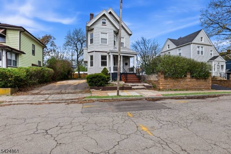 Welcome to 11 Dodd Ter, a beautifully renovated Colonial sitting on a dead end street offering spacious living, modern updates, and a versatile layout in East Orange.