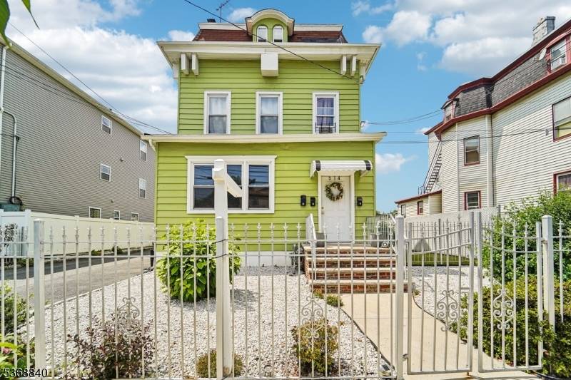 Exceptional Investment OpportunitySolid three family property situated on an oversized lot in a prime area of town.