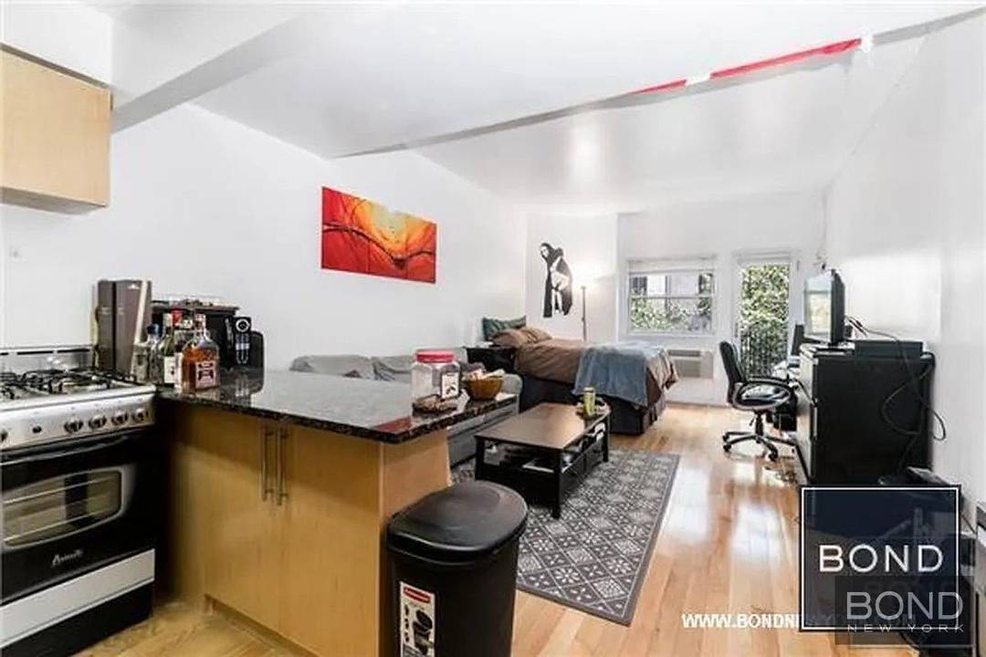 Spectacular fully renovated studio in the heart of Greenwich Village with private outdoor space in a doorman building !