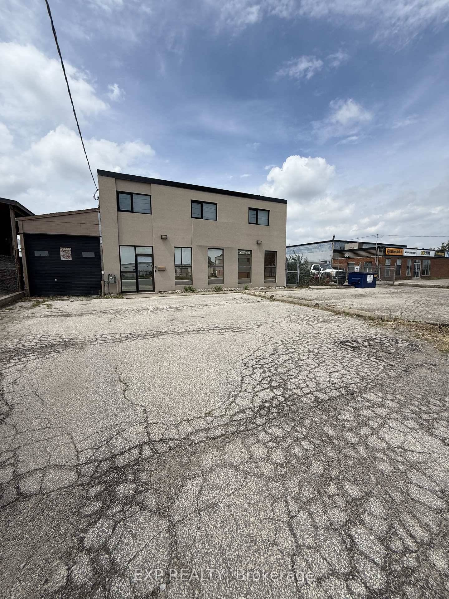 Freestanding building with outside storage in prime Mississauga location.